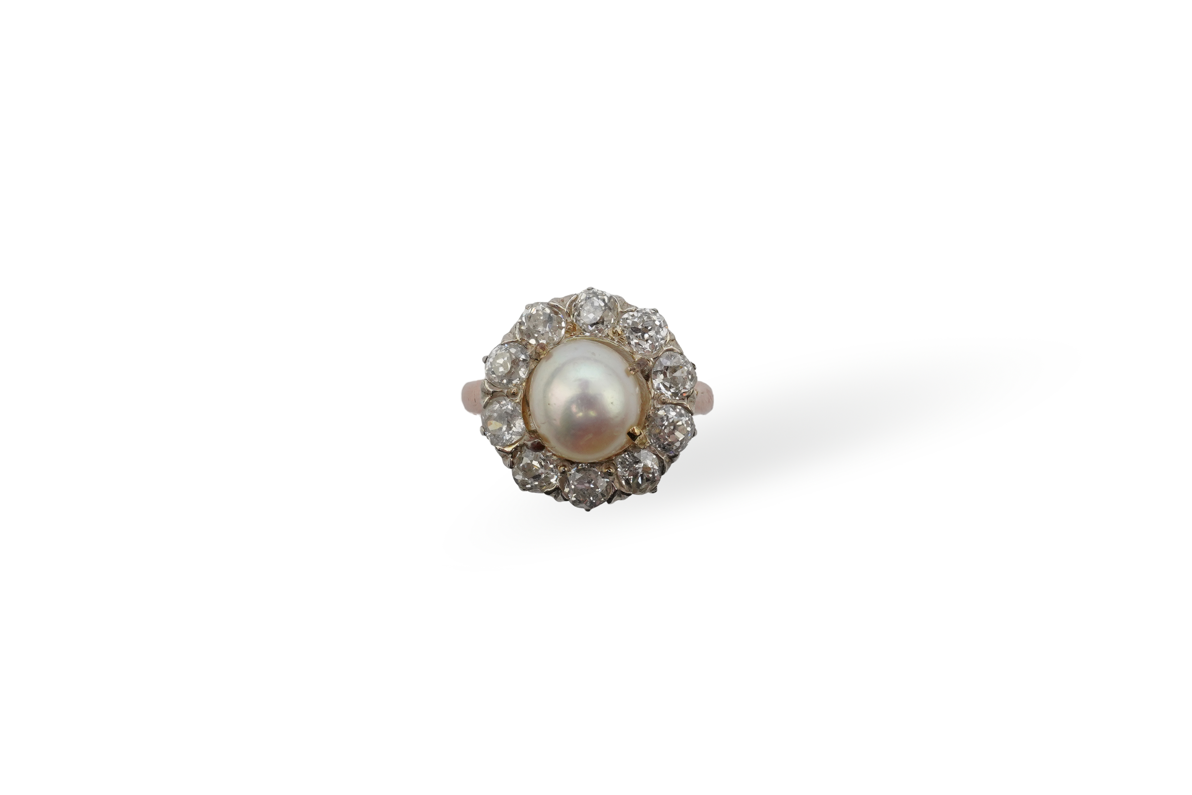 A cultured pearl and diamond ring